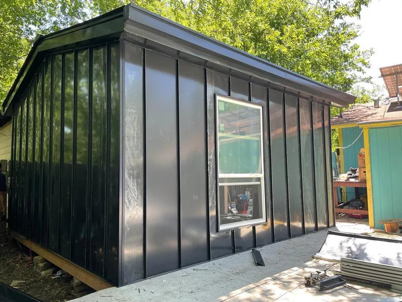 Black standing seam metal wall panels for Metal Roof Installation in Shrewsbury